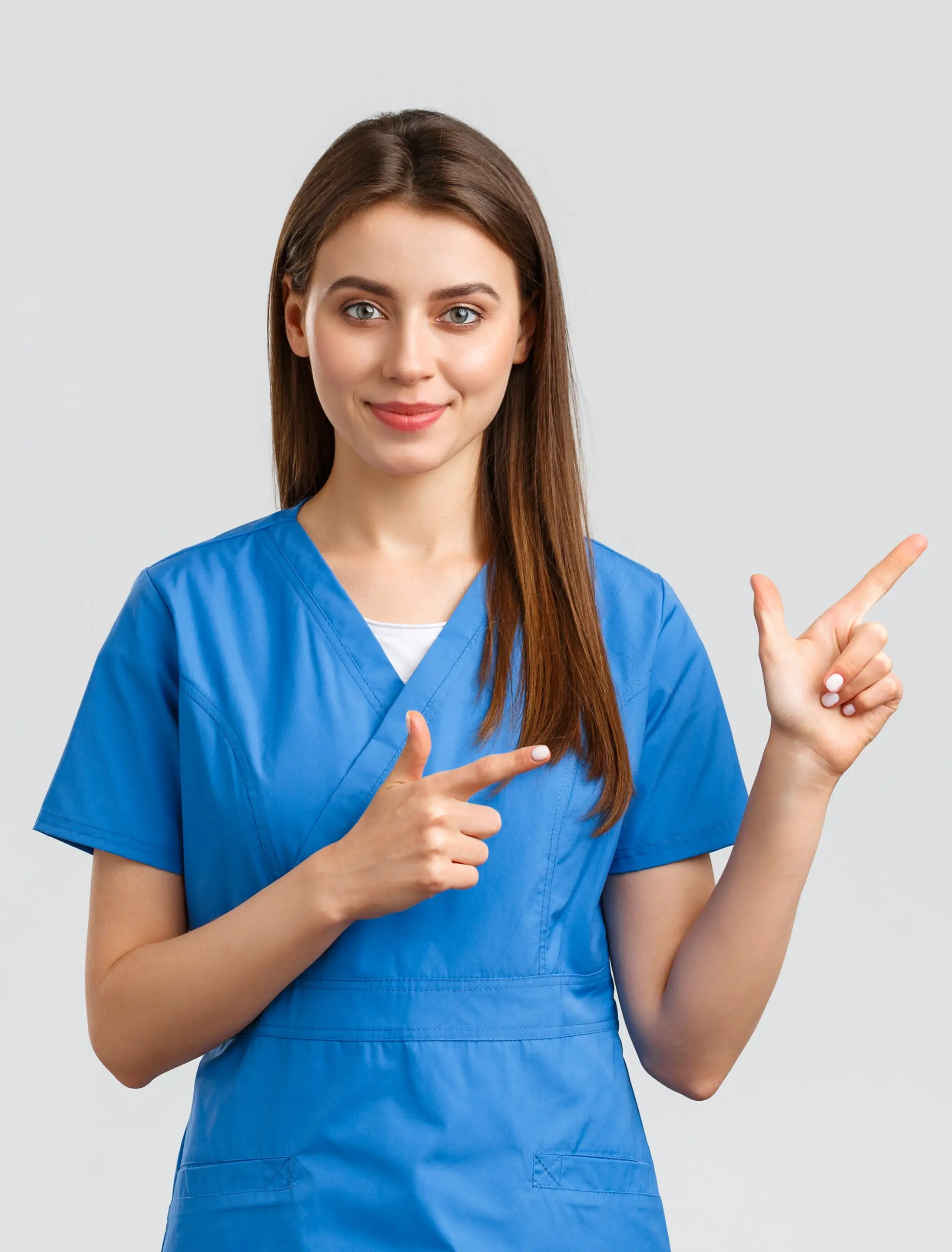 Enfermera feliz enseñando las carillas de porcelana Enfermera feliz enseñando las carillas de porcelana